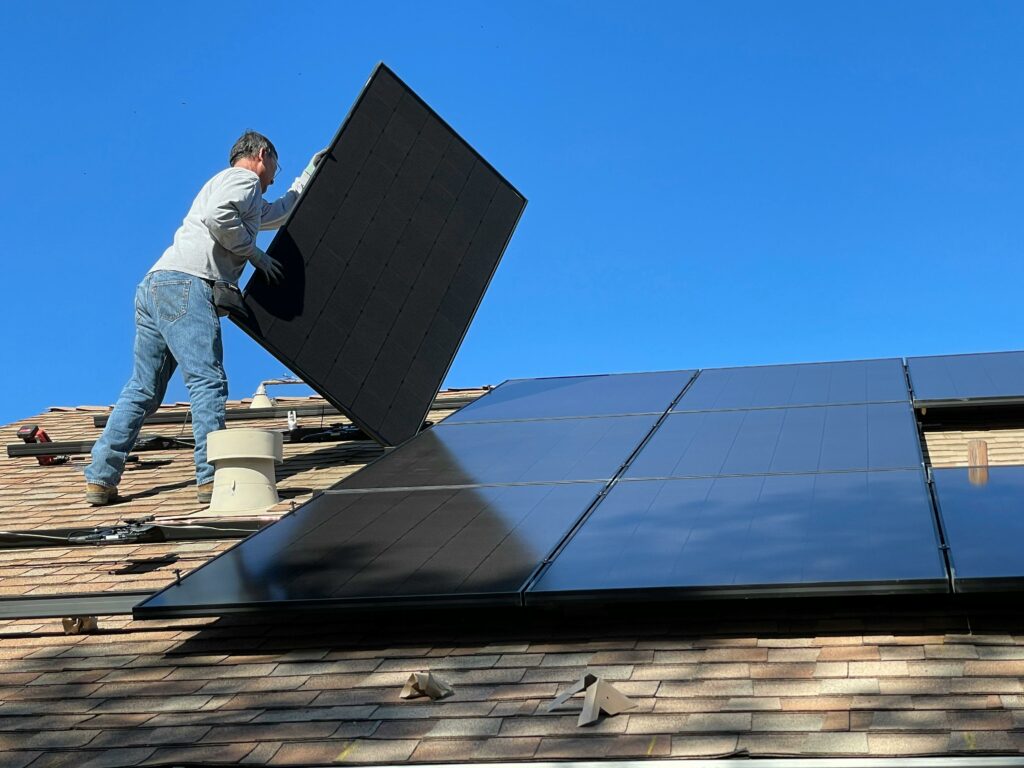 Air source heat pump maintenance with solar panels